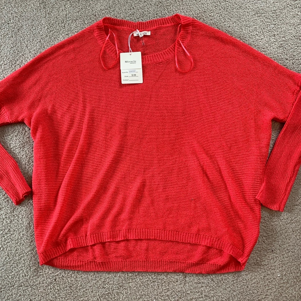 Dark neon pink dolman sleeve sweater.